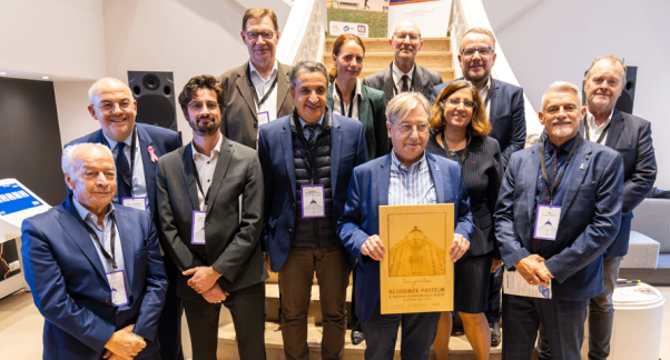 Photo de groupe du CP Action Logement engagé pour loger les salariés messins avec une convention de territoire et deux inaugurations dans un bâtiment historique transformé 